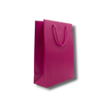 Bolsa mediana PartyStore color buganvilia con asas de cordón trenzado, ideal para regalos y eventos.