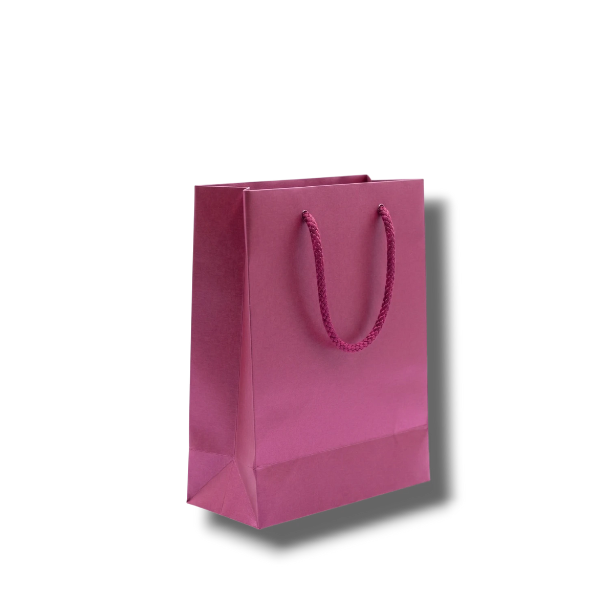Bolsa de regalo mini de PartyStore en color rosa metálico con asas de cordón trenzado a juego