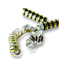 Serpentinas PartyStore en color dorado y negro con acabado metálico brillante para decoración de fiestas